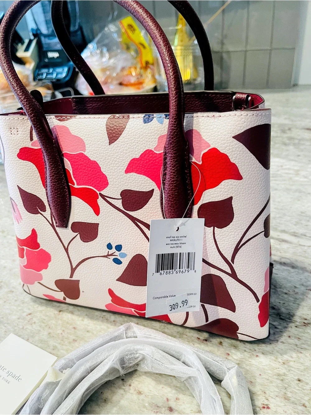This is the Kate Spade New York Eva Nouveau Bloom Small Top Zip Satchel
